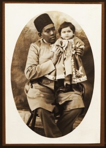Based on the captions of other photos from the same album written by Masoud Mirza Zell-e-Soltan, the photographer of this image is Zell-e-Soltan himself and the baby in the picture a granddaughter, probably Nim Taj Khanum (Lady Nim Taj), with her African slave, in Isfahan, 1890s. During the Qajar period babysitting and accompanying royal and aristocratic children to their classes were among the main duties of African slaves. Photograph: Zell-e-Soltan/Kimia Foundation 