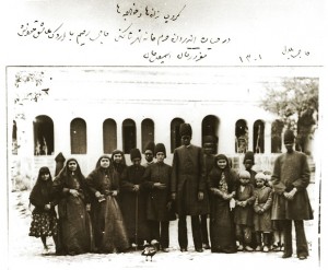 In this photo taken and captioned by the king himelf, a group of his wives and eunuchs are shown inside the harem garden in one of the royal complexes in north Tehran, Shahrestanak. The five African slaves include two adults, probably Ethiopian, and three adolescents: Haji Bilal (the first adult African slave from the right), Maqrur Khan (the fourth adult African slave from the right), Ismail Khan (the first adolescent white slave from the right), Haji Rahim (the second white slave from the right, head of the harem slaves), 1883. Photograph: Nasser al-Din Shah/Photo Archive, Golestan Palace Museum, Tehran, Iran 