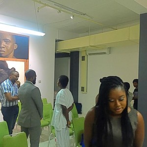 Guests admiring the depth of Babatunde Olatunji's work 