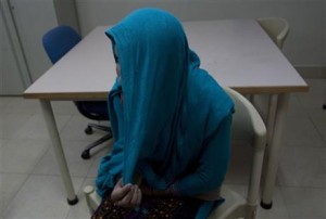 In this photo taken on Jan. 26, 2016, Azra talks to The Associated press about in Karachi, Pakistan. When Azra was 18, her family sold her for $5000 to an older man who passed her around to strangers. She ran away, and now she is fighting for a divorce and too afraid to leave the shelter’s walls. The court have yet to decide on her case and mostly Azra _ who is just 20 and gave only her first name _ wonders where she will go when the time comes to leave the shelter. (AP Photo/Shakil Adil)