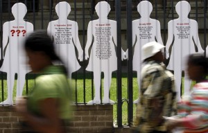 Placards voicing the concerns of rape victims outside the High Court in Johannesburg. Photo: epa / Kim Ludbrook