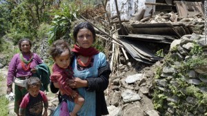 Two women in northeastern Nepal on their way to see doctors, on May 14, 2015, after earthquakes killed over 8,000 people and left hundreds of thousands homeless . 