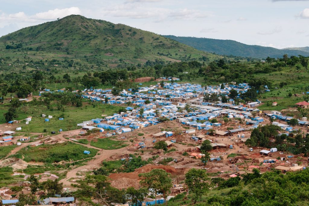 An aerial view of an artisanal mining complex in Uganda. The mining area is seen in the foreground. Photograph: Eelco Roos/Hivos