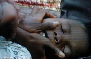 Screengrabs from a video of children in the Congo receiving exorcisms (pictured). There were 679 alerts in the past 18 months of children at risk of trafficking.
