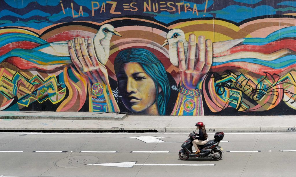 A mural in Bogotá, the Colombian capital, proclaims: “Peace is ours”. At least 220,000 people have been killed during the country’s long-running civil war. Photograph: Guillermo Legaria/AFP/Getty Images