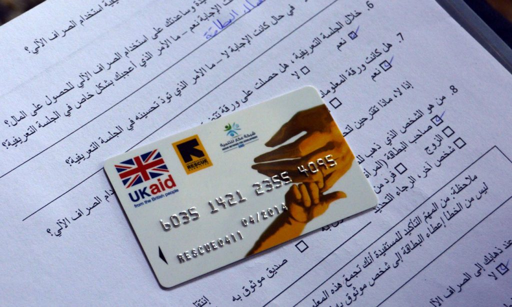The International Rescue Committee provides cash assistance to Syrian refugees in Lebanon by means of an ATM bank card. Photograph: Ned Colt/IRC