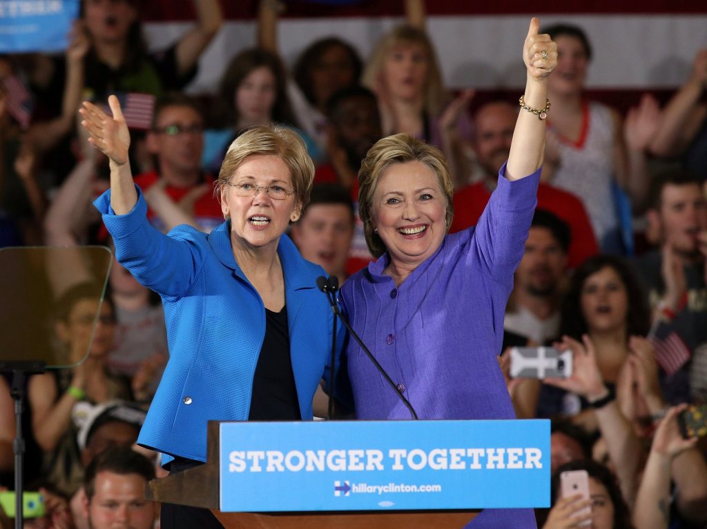 Hillary Clinton stands alongside Elizabeth Warren at a campaign rally in Cincinnati. Photograph: Aaron Josefczyk/Reuters