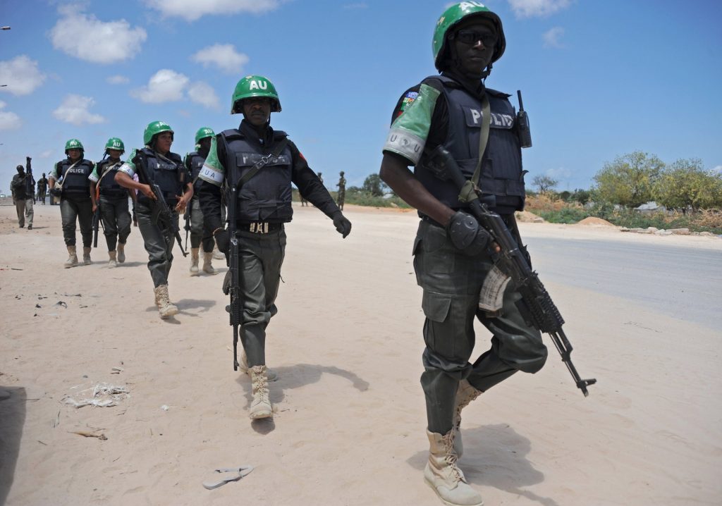 Officers from Amisom, the AU’s mission in Somalia, patrol the capital, Mogadishu, in April 2015. Photograph: Mohamed Abdiwahab/AFP/Getty Images