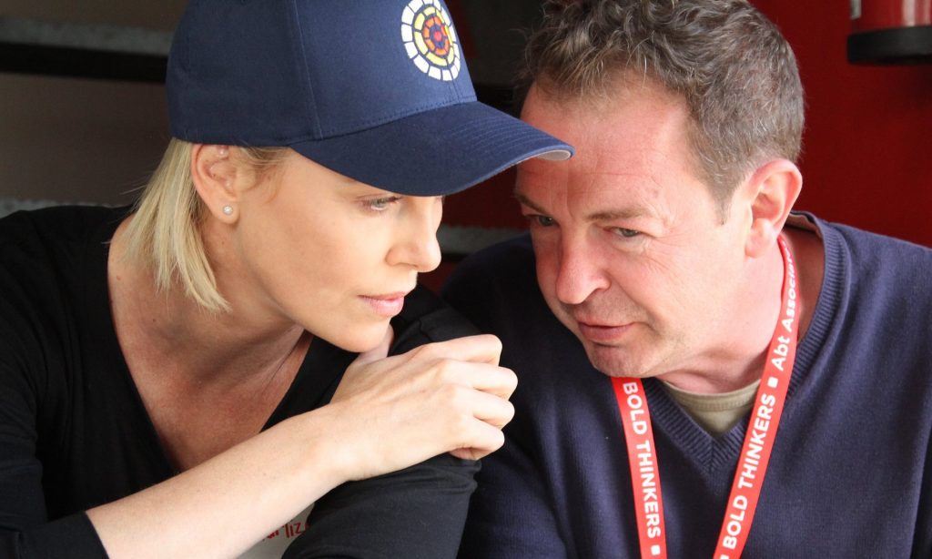 Charlize Theron with WhizzKids United founder Marcus McGilvray. Photograph: Leigh Page