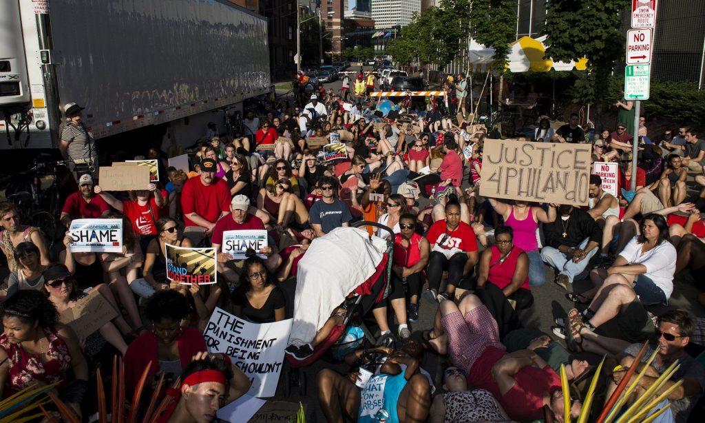 Activists protest on Friday in downtown Minneapolis, Minnesota, against the death of Philando Castile. Photograph: Stephen Maturen/Getty Images