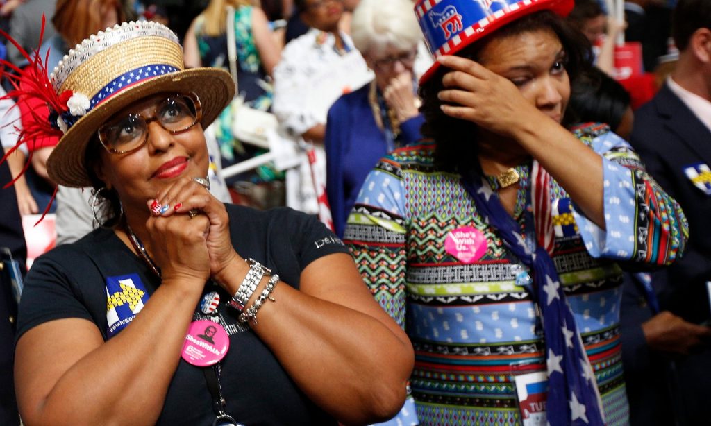 Delegates react as Hillary Clinton appears live via satellite at the conclusion of the second day of the Democratic national convention. Photograph: Justin Lane/EPA