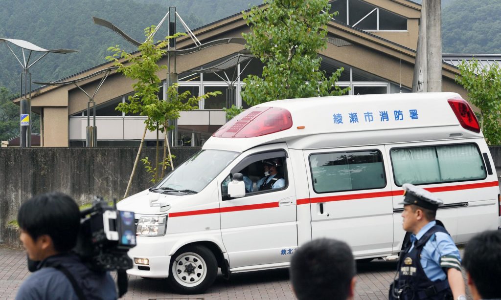 An ambulance outside the facility for disabled people where at least 15 people have been killed and dozens injured in a knife attack in Sagamihara, outside Tokyo. Photograph: AP