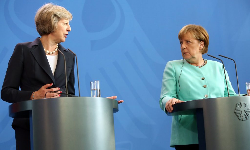 May and Merkel give a joint press conference in Berlin. Photograph: Adam Berry/Getty Images