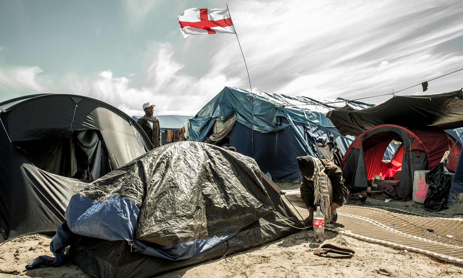 A camp for migrants and refugees in Calais. May and Hollande are in agreement that the border between France and the UK will remain in the French port Photograph: Philippe Huguen/AFP/Getty Images