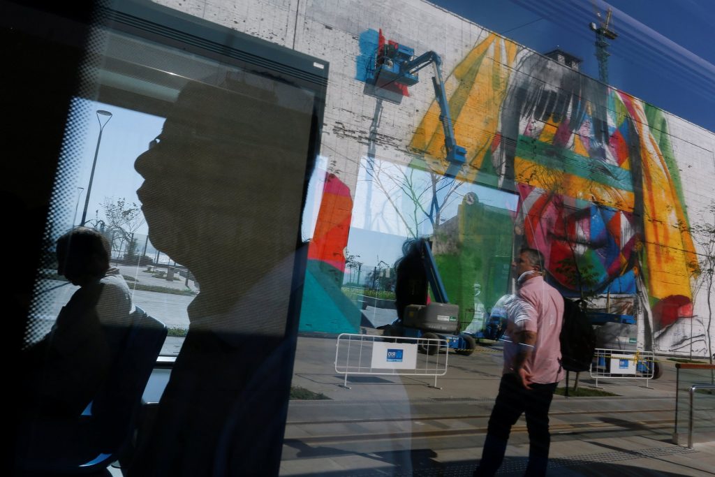 Reflections of a mural on Rio’s Olympic Boulevard. Photograph: Bruno Kelly/Reuters