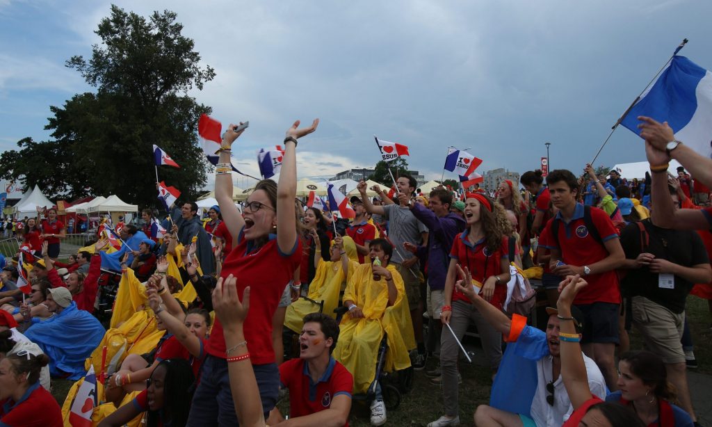 Pilgrims at a concert as part of the Youth Festival during the festival. Photograph: Stanislaw Rozpedzik/EPA