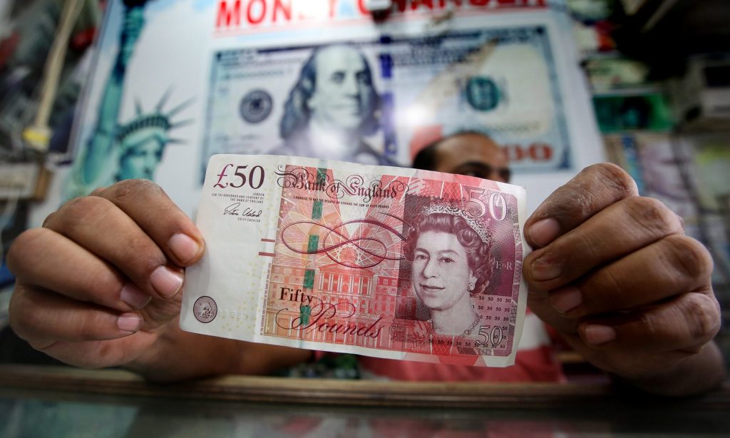 The fall in value of the pound has wiped £1bn off the UK’s annual aid budget. Photograph: Rajat Gupta/EPA