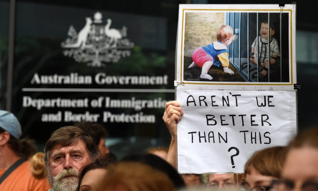 Pro-refugee demonstrators rally outside Australia’s Department of Immigration and Border Protection in Brisbane. Photograph: Dan Peled/EPA