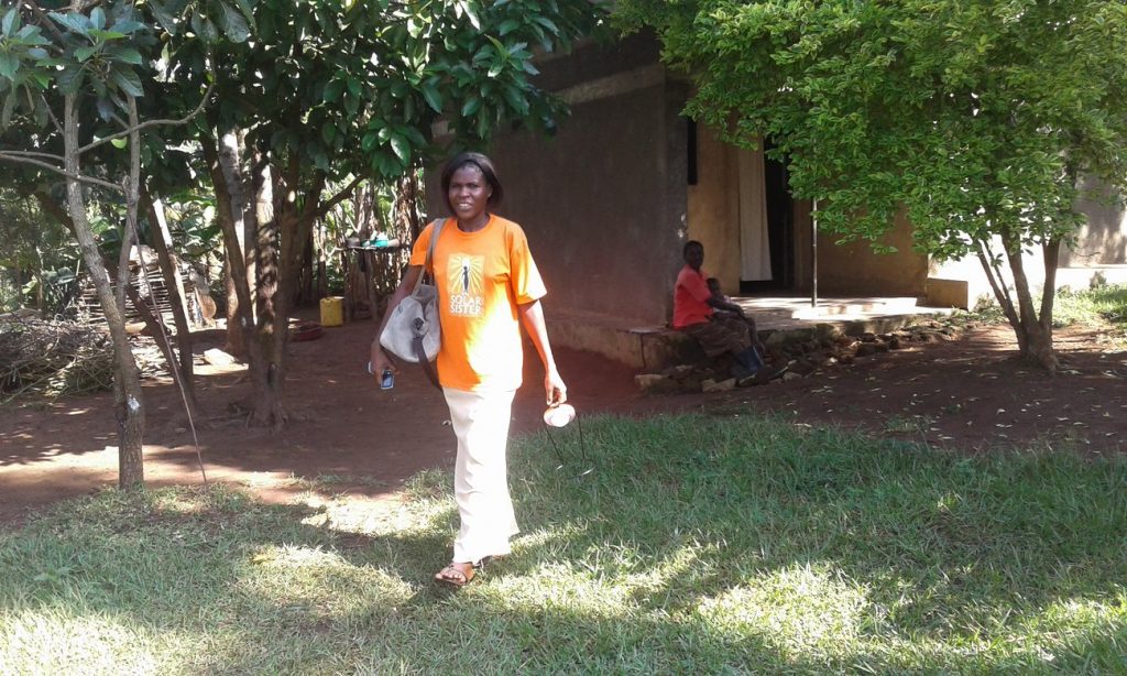 Harriet Nabukwasi in Tororo, eastern Uganda, working as part of the Solar Sister programme, which helps rural women start renewable energy businesses. Photograph: Alon Mwesigwa 