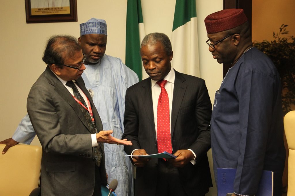 Chairman Global Steel Holdings Limited, Mr Prammod Mittal; Minister of State for Solid Minerals Development, Hon Abubakar Bawa Bwari; Vice President Yemi Osinbajo; and the Minister for Solid Minerals Development, Dr Kayode Fayemi; during the signing of Modified Concession Agreement for the Nigerian Iron Ore Mining Company (NIOMCO) at the State House, Abuja.
