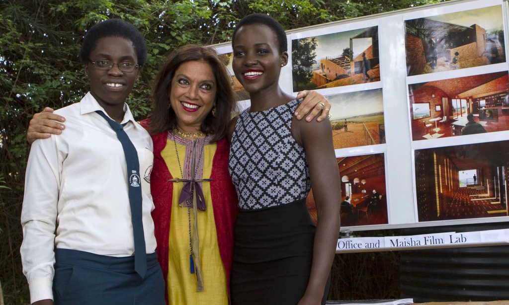 Girls on film: with director Mira Nair and Lupita Nyong’o, who plays Phiona’s mother in the new film. Photograph: Isaac Kasamani/AFP/Getty Images 