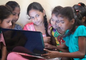 Girls learn how to use computers at a Dharavi Diary slum school in Mahim, Mumbai. Photograph: Courtesy of Dharavi Diary