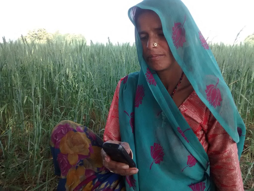 A reporter prepares to record interviews for Khabar Lahariya in Lalitpur, Uttar Pradesh
