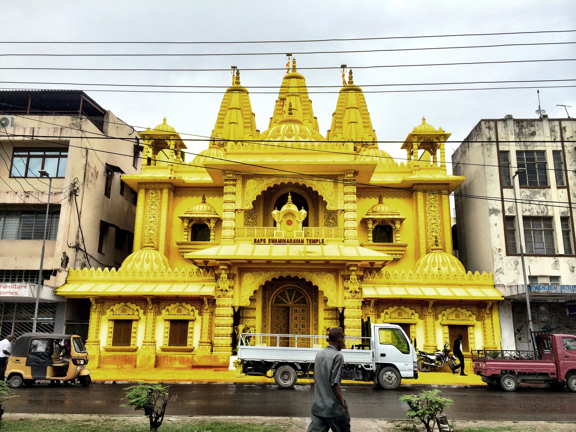 Optimistic yellow … the Baps Swaminarayan temple in Nairobi. Photograph: Mohammed Altoum