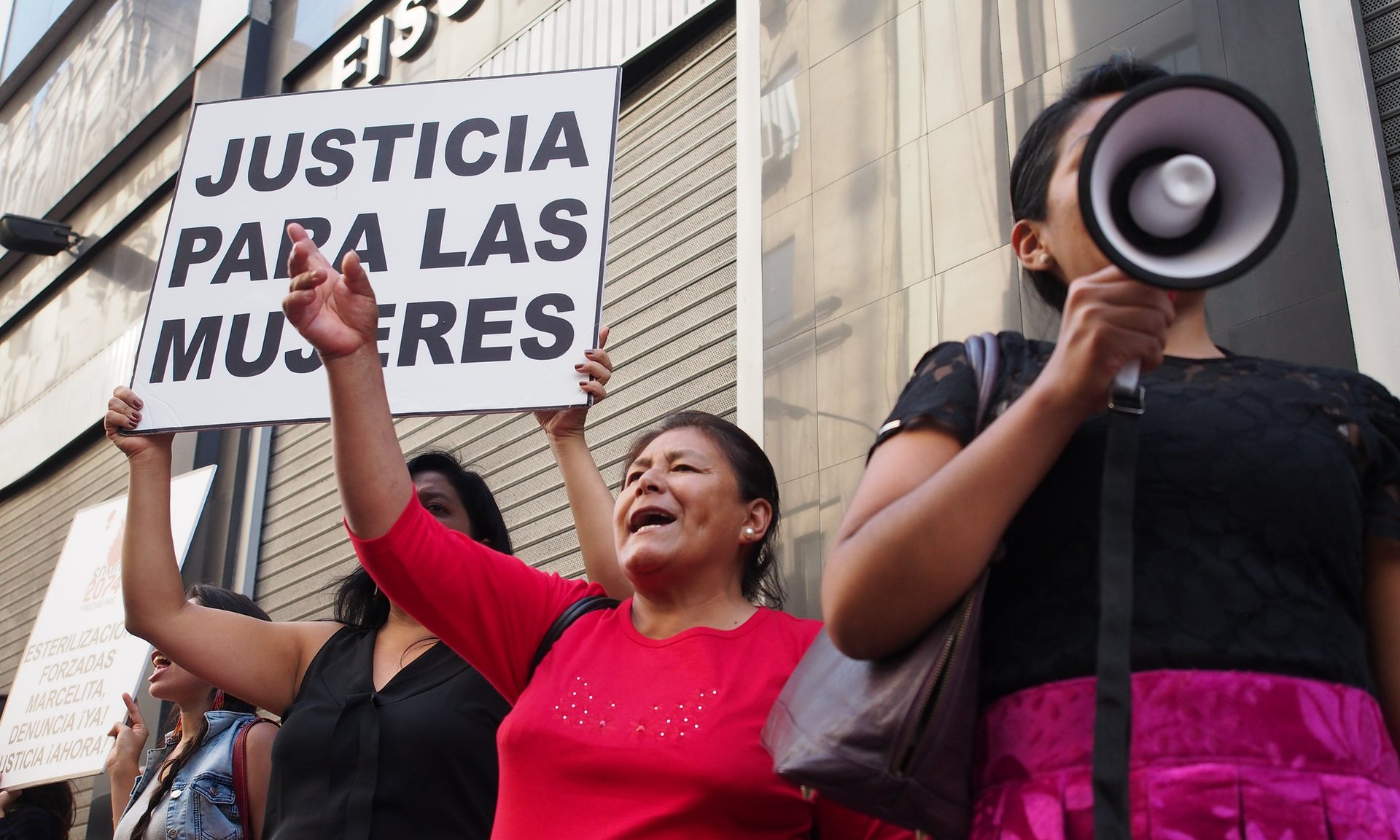 Women protest outside the prosecutor’s office in Lima demanding justice for rural women who were forcibly sterilised, 10 May 2016. Photograph: Pacif/Rex/Shutterstock