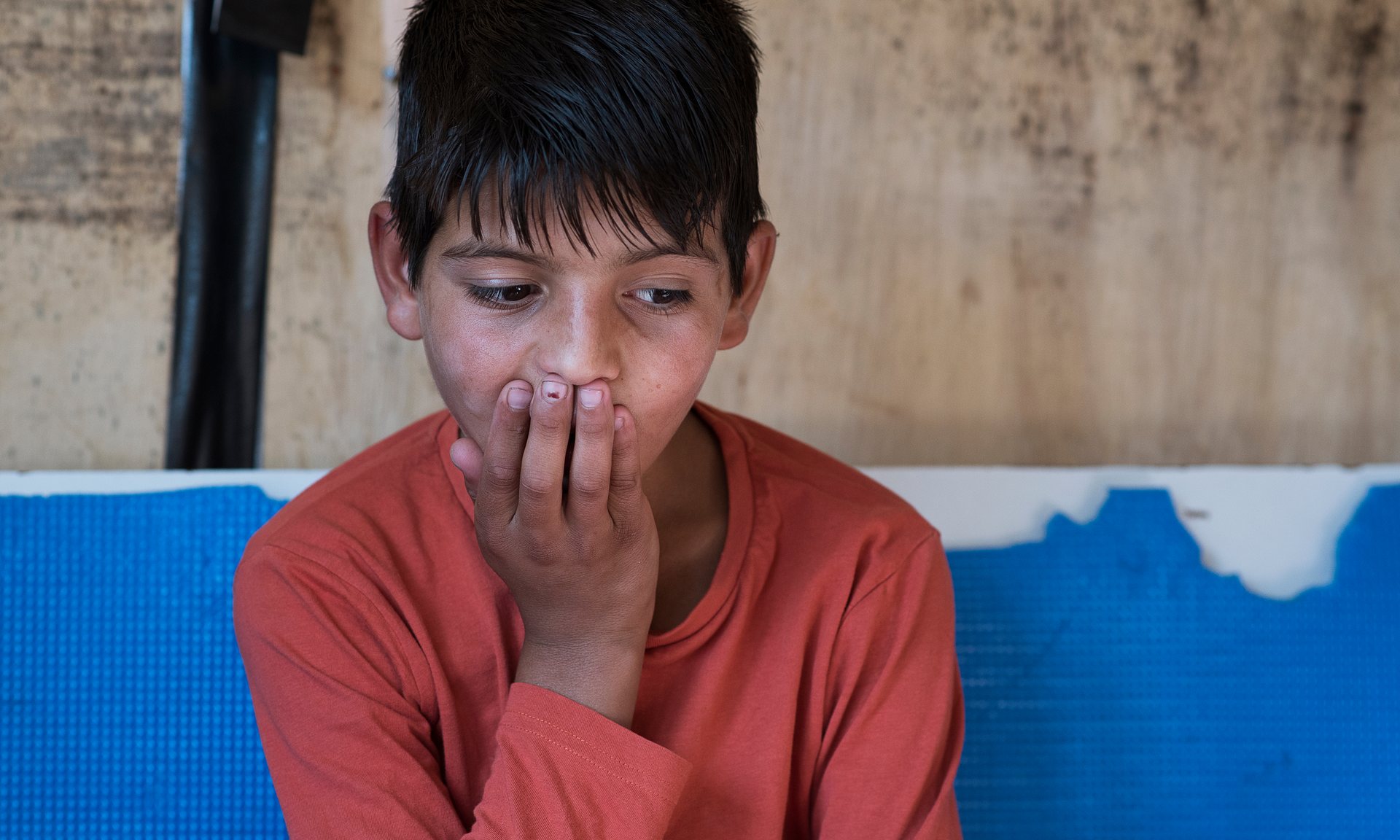 Abdul, 10, lives on his own in Calais, where he looks after his nine-year-old nephew as they try to get to the UK. Photograph: Alecsandra Raluca Drăgoi for the Guardian