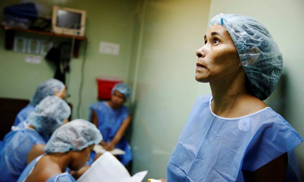 Women wait for sterilization surgery a hospital in Caracas, Venezuela, last month. Photograph: Carlos Garcia Rawlins/Reuters