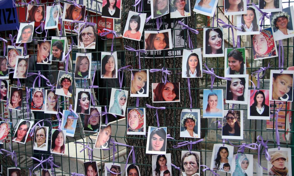 A photo exhibition of murdered women staged as a protest against violence towards women in Ankara, March 2015. Photograph: Adem Altan/AFP/Getty Images