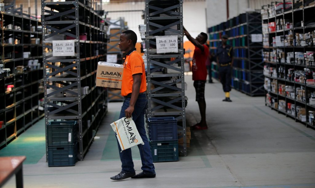 Processing orders in a Jumia warehouse. Photograph: Akintunde Akinleye/Reuters