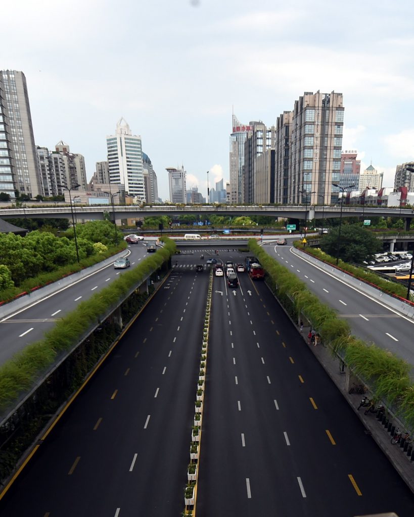 West Lake Road in Hangzhou. Hangzhou has been massively upgrading the city’s infrastructure with such improvements as repaving roads, expanding its subway system and dredging waterway for the G20 summit. Photograph: Xinhua / Barcroft Images