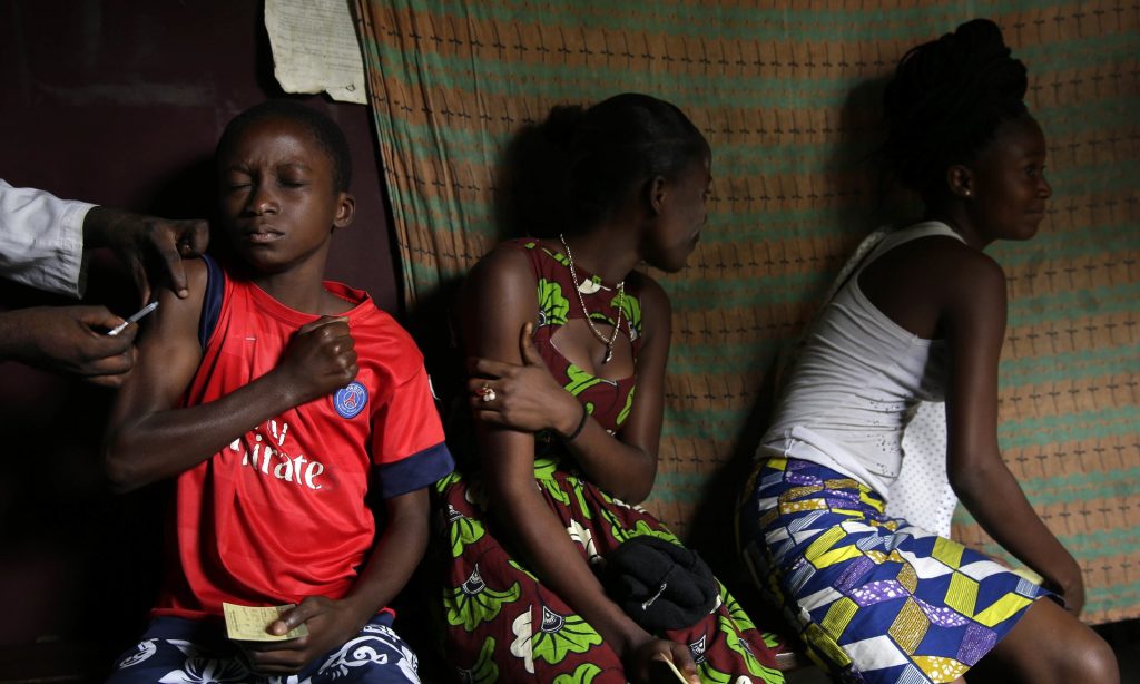 Residents of the Kisenso district of Kinshasa, receiving yellow fever vaccine injections last month. Photograph: Jerome Delay/AP