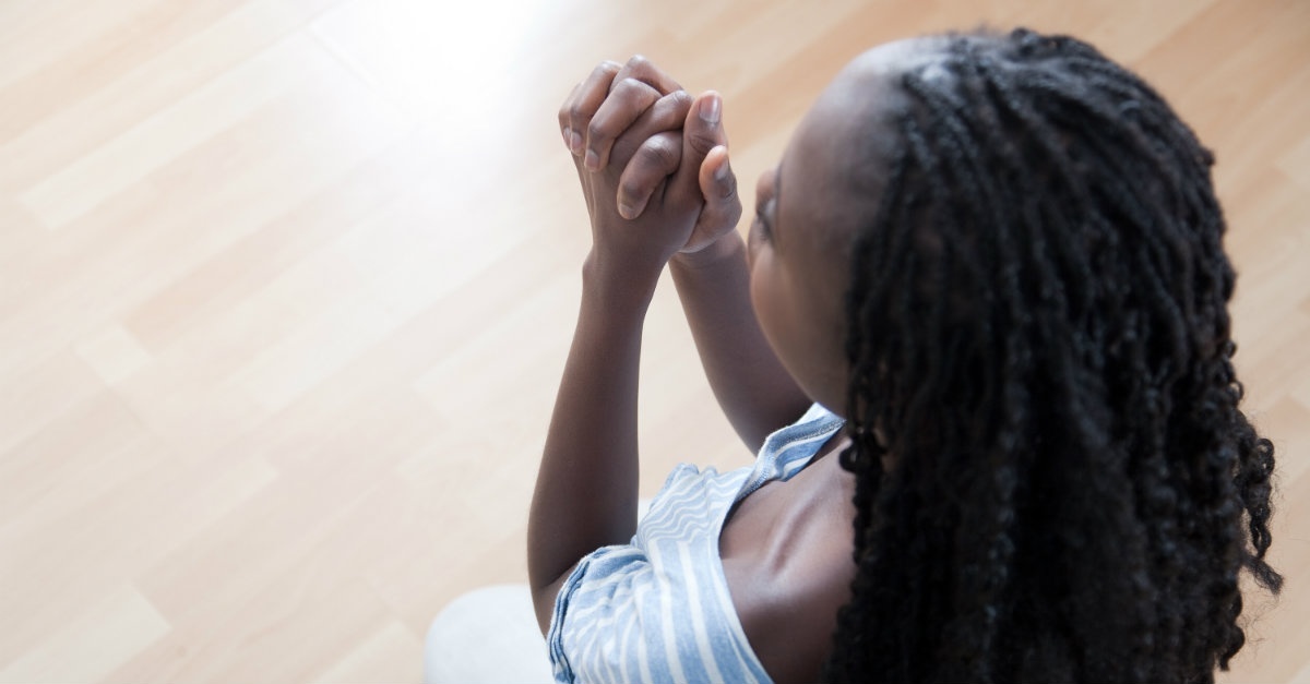 praying-on-knees-woman