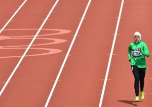 Saudi Arabia's Sarah Attar competes in the women's 800m heats at the athletics event of the London 2012 Olympic Games on August 8, 2012 in London. AFP PHOTO / GABRIEL BOUYS        (Photo credit should read GABRIEL BOUYS/AFP/GettyImages)