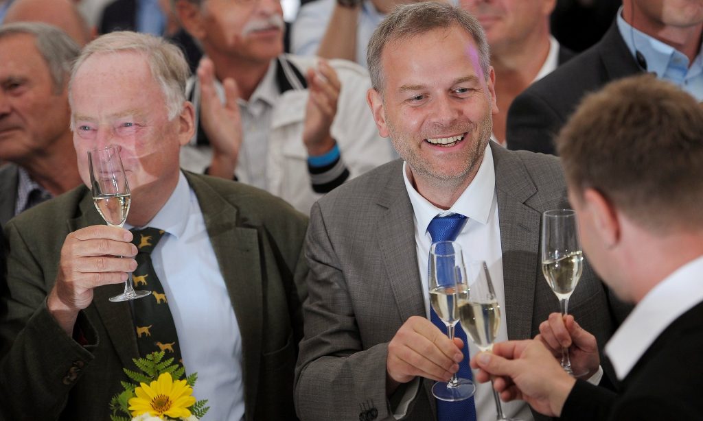 Leif-Erik Holm and Alexander Gauland of AfD react after exit polls in Mecklenburg-Vorpommern. Photograph: Stefanie Loos/Reuters