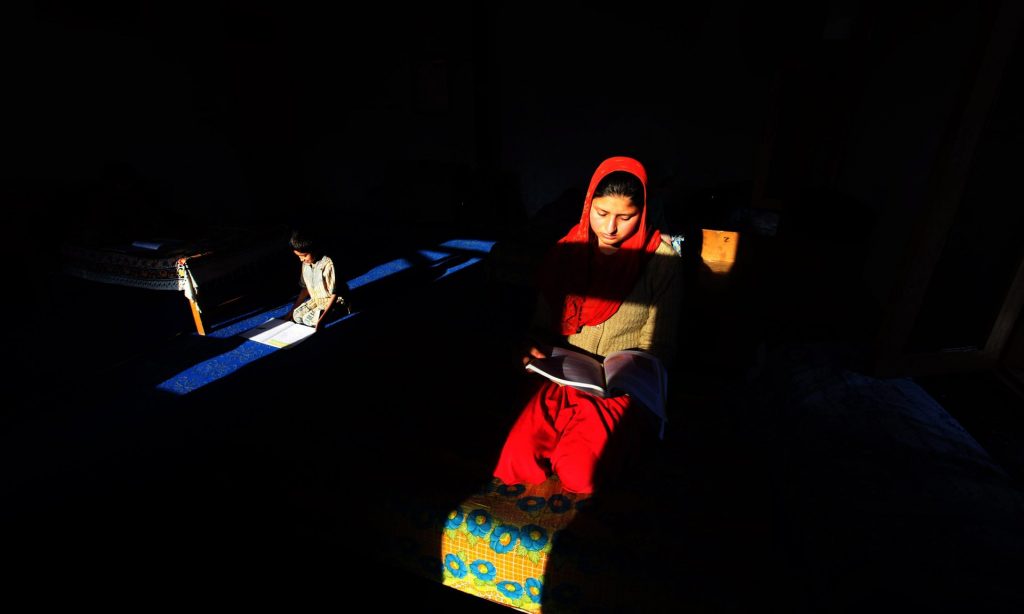 Kashmiri children study at an orphanage close to Srinagar. A 2014 Save the Children survey found there are more than 200,000 orphans in Jammu and Kashmir, a third of whom have lost one or both parents due to conflict. Photograph: Farooq Khan/EPA