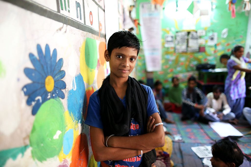 Vivek, 15 works in a roadside cafe near a railway station and reports for the newspaper. At his job he is able to observe the lives of many street children, whose stories he then shares in the newspaper. (Showkat Shafi/Al Jazeera)