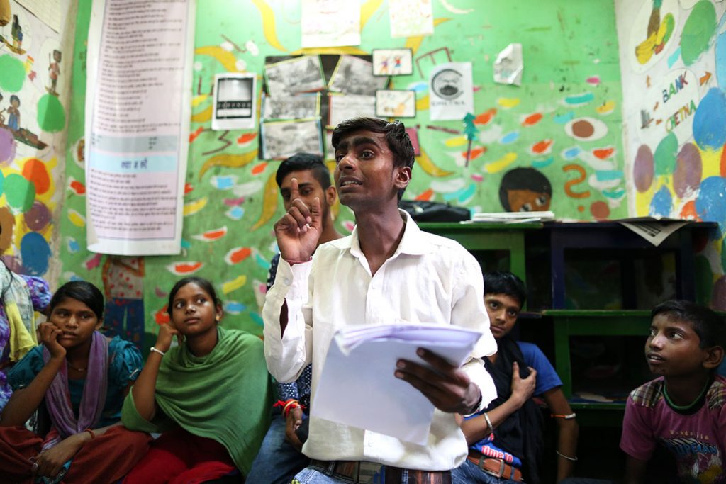 Shambhu, 17 is the editor of the Balaknama. In the mornings he washes cars in ne of Delhi's posh areas. In the afternoons, he spends most of his time working on the newspaper. (Showkat Shafi/Al Jazeera)