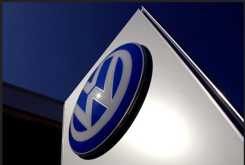 A Volkswagen logo adorns a sign outside a dealership for the German automaker located in the Sydney suburb of Artarmon, Australia, October 3, 2015. REUTERS/David Gray/File Photo