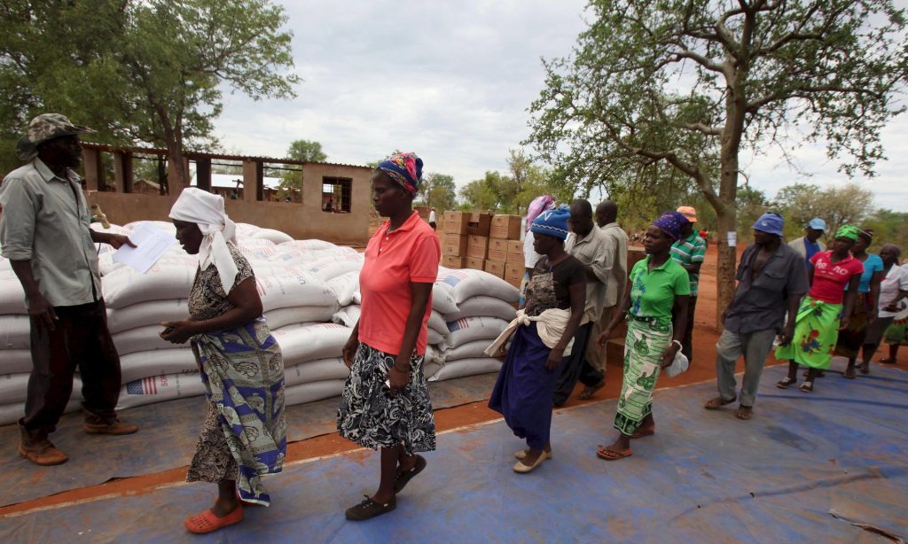 Villagers in Masvingo collect monthly rations provided by the World Food Programme. Drought has created a major food crisis in Zimbabwe. Photograph: Philimon Bulawayo / Reuters/Reuters