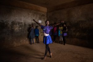 "When I was young I saw ballet on TV, I liked the dance and the pointing shoes, and I wanted to be a ballerina since then" says Pamela 13, one of the older students in the class