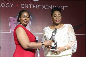 Vanguard Newspaper Woman Editor Morenike Tarie presenting the award to Erelu Bisi Adeleye-Fayemi