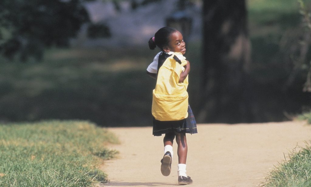 child walking to school
