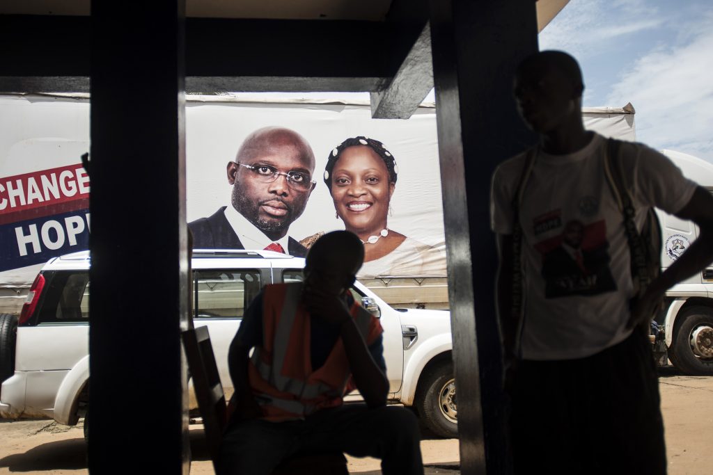 Billboard picturing Congress for Democratic Change candidate Weah. Photographer: Cristina Aldehuela/AFP via Getty Images