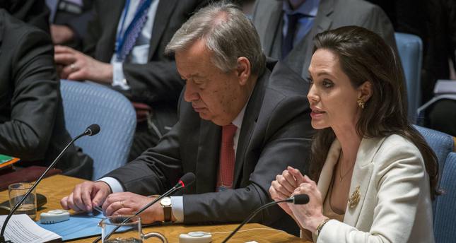 United Nations High Commissioner for Refugees (UNHCR) special envoy, actress Angelina Jolie (R), speaks during a United Nations Security Council meeting regarding the refugee crisis in Syria at the United Nations Headquarters in New York  April 24, 2015. REUTERS/Lucas Jackson