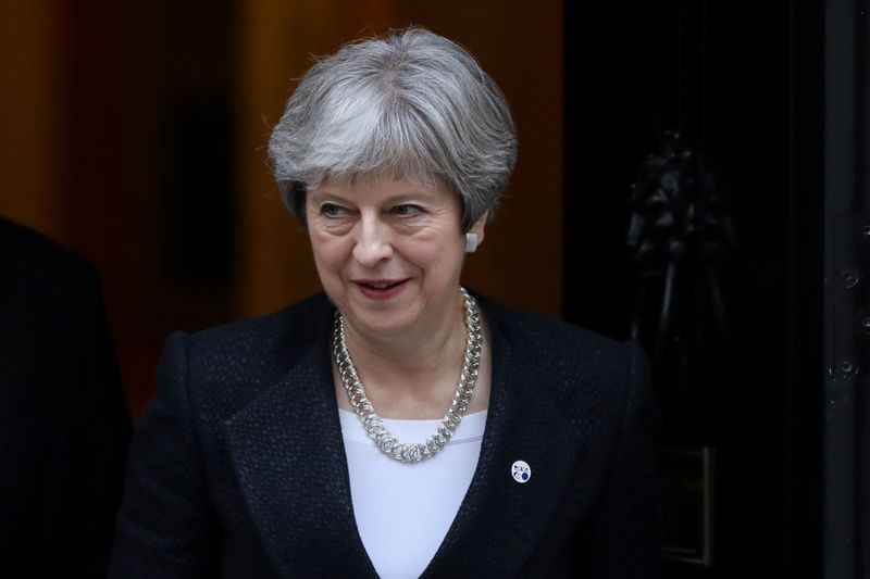Theresa May, U.K. prime minister, leaves number 10 Downing Street following a meeting with Estonia's Prime Minister Juri Ratas in London, U.K., on Tuesday, Jan. 30, 2018. Brexit campaigners in the U.K.'s governing Conservative Party would be "foolish" to try to overthrow May, Cabinet minister Liam Fox warned, as the prime minister battles critics on multiple fronts. Photographer: Luke MacGregor/Bloomberg
