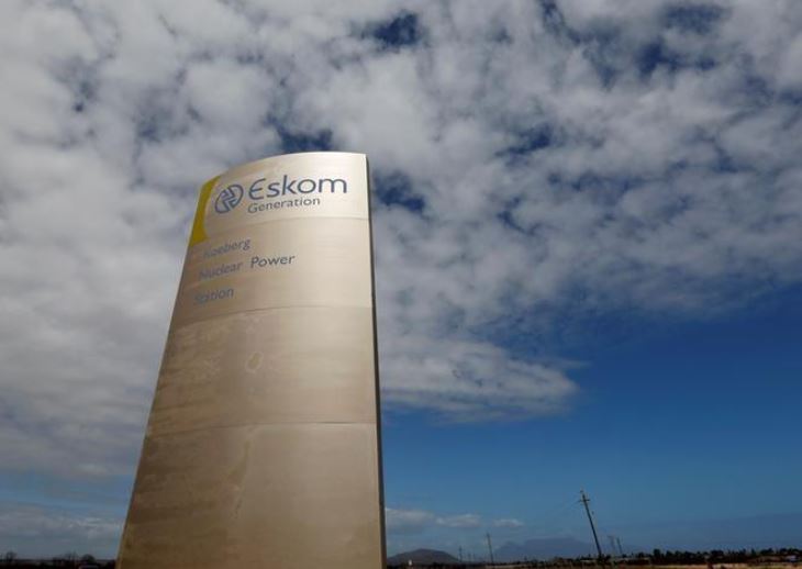 Reuters Staff 2 Min Read JOHANNESBURG (Reuters) - South African state utility Eskom is seeking to recover 66.6 billion rand ($5.5 billion) of costs incurred over the past three years through higher tariffs, saying it sold less electricity than forecast because of an economic downturn. The logo of state power utility Eskom is seen outside Cape Town's Koeberg nuclear power plant in this picture taken March 20, 2016. REUTERS/Mike Hutchings/File Photo